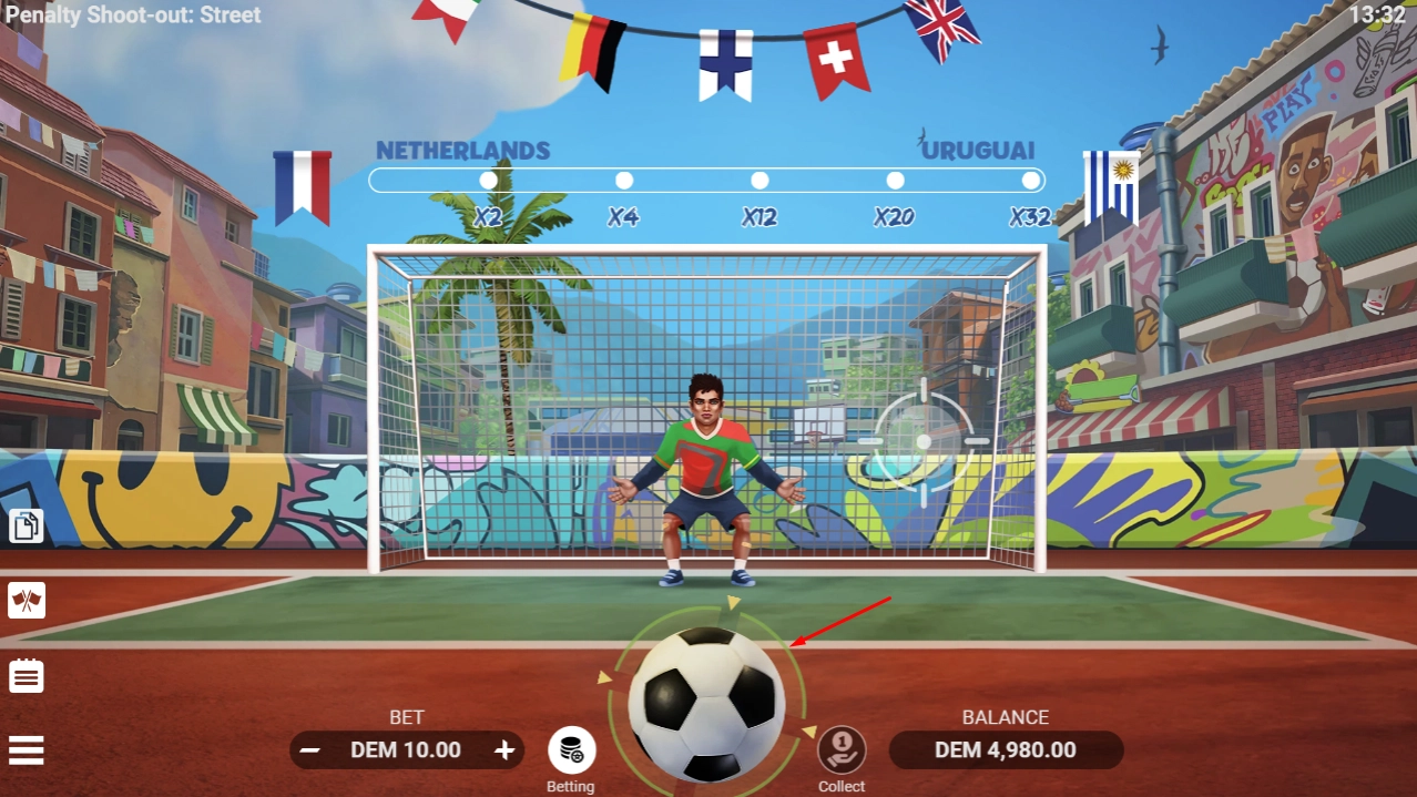 Player preparing to kick the football against the goalkeeper in the street
